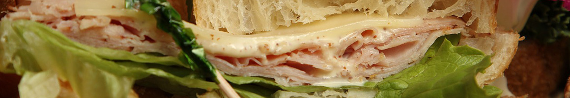 Eating Sandwich Cafe at Dunneville Market & Kitchen restaurant in Hollister, CA.